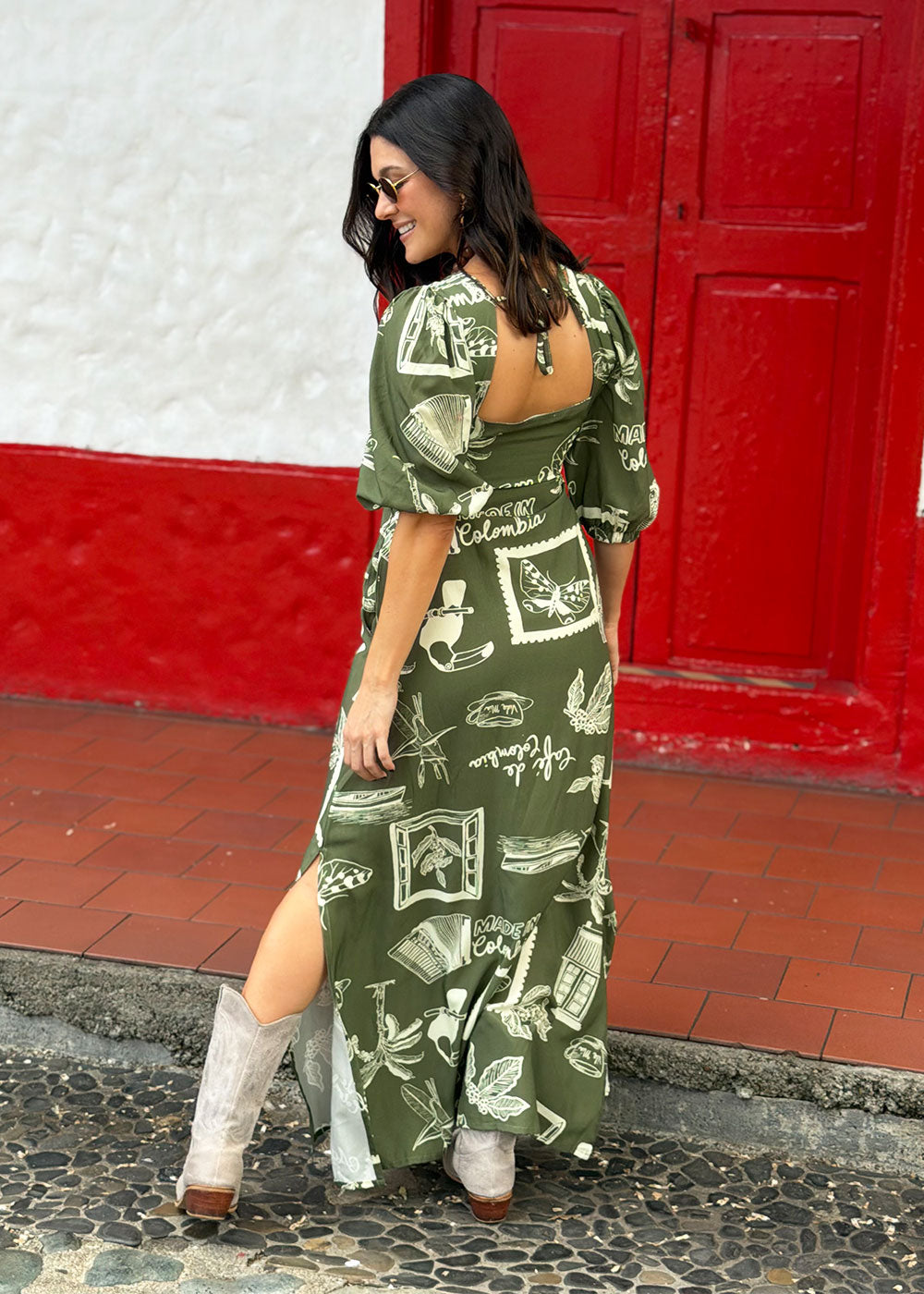 long green dress side profile flowing hem