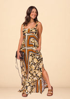 Brown printed viscose maxi dress with fitted bodice, smocked back, and ruffled hem