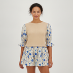 Blusa Posh Mangas Cortas Estampado Peplum para Damas con modelo (AI)