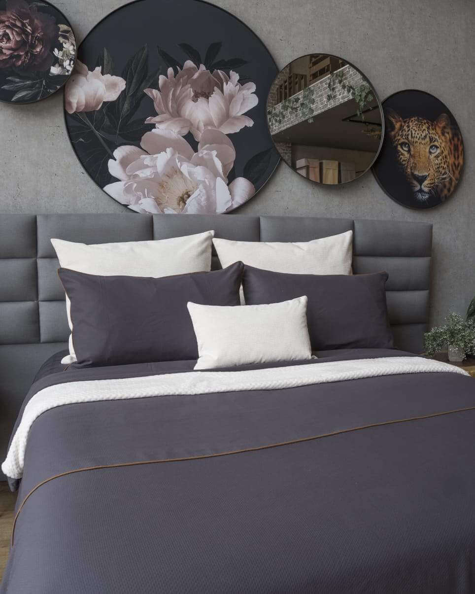 Elegant Bruna Gris duvet cover set in a soft gray tone, crafted from a cozy cotton-polyester blend for bedroom sophistication.