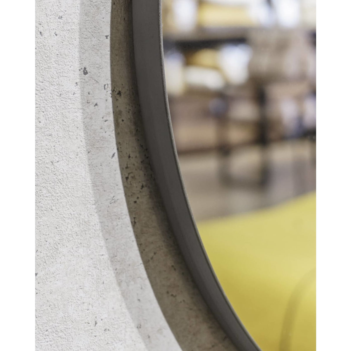 Elegant round Rotterdam mirror with a sleek steel frame, adding modern style and brightness to any room.