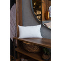 Soft and fluffy Ecoplumas cushion filling in various sizes, perfect for adding cozy volume to your bed or sofa.