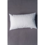 Soft and fluffy Ecoplumas cushion fillings in various sizes, perfect for adding cozy volume to your bed or sofa.