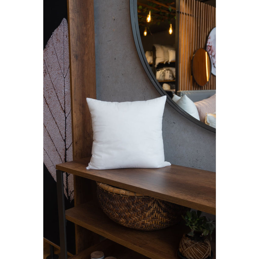 Soft and fluffy Ecoplumas cushion fillings in various sizes, perfect for adding cozy volume to your bed or sofa.