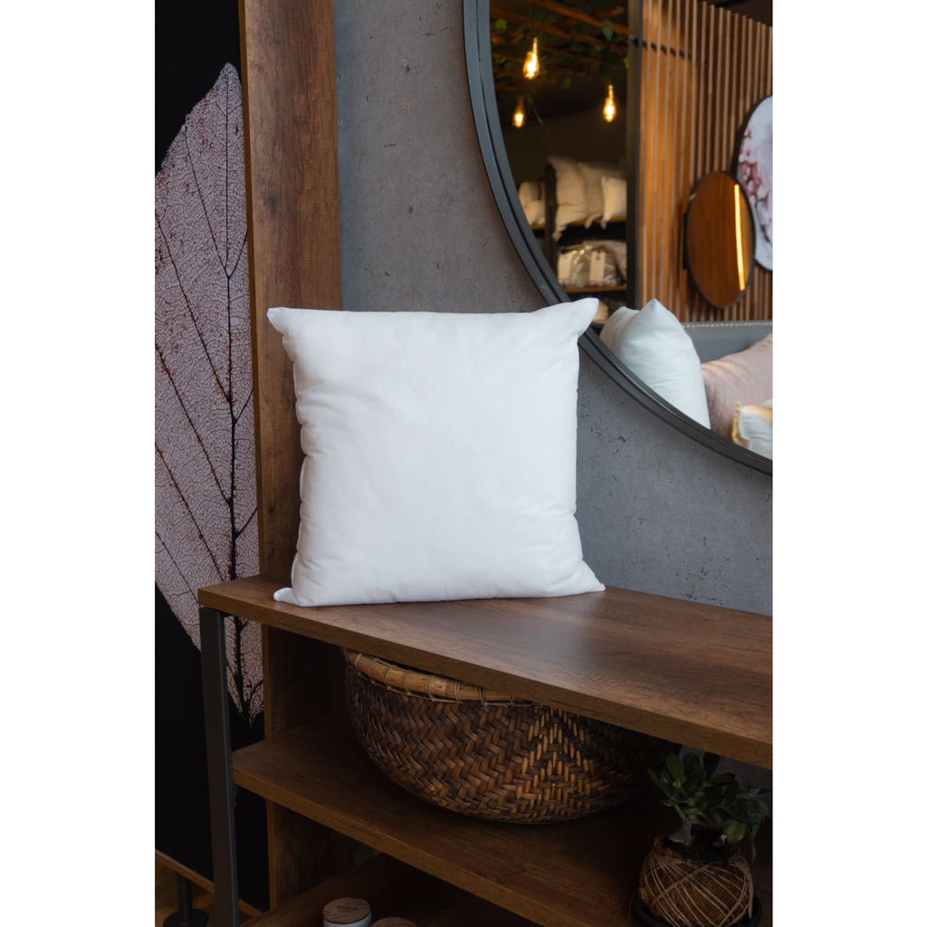 Soft and fluffy Ecoplumas cushion fillings in various sizes, perfect for adding cozy volume to your bed or sofa.