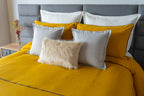 Vibrant Kalahari Mostaza duvet cover set in a unique mustard hue, adding bold style and cozy texture to your bedroom.