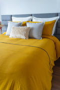 Vibrant Kalahari Mostaza duvet cover set in a striking mustard hue, featuring unique patterns to elevate bedroom style.