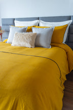 Vibrant Kalahari Mostaza duvet cover set in a striking mustard hue, featuring unique patterns to elevate bedroom style.