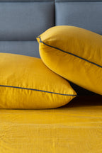 Cozy Kalahari Mostaza duvet cover set in a vibrant mustard hue, featuring unique patterns and a sleek zipper closure.