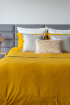 Vibrant Kalahari Mostaza duvet cover set in a striking mustard hue, featuring unique patterns to elevate bedroom decor.