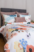 Charming pink Mi Jardín Rosa duvet cover set with unique floral designs, perfect for styling your bed with elegance.