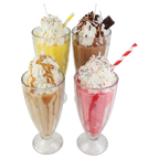 Four Creamy Milkshake candles shown together in glasses, with cream-like swirls and colorful decorations.