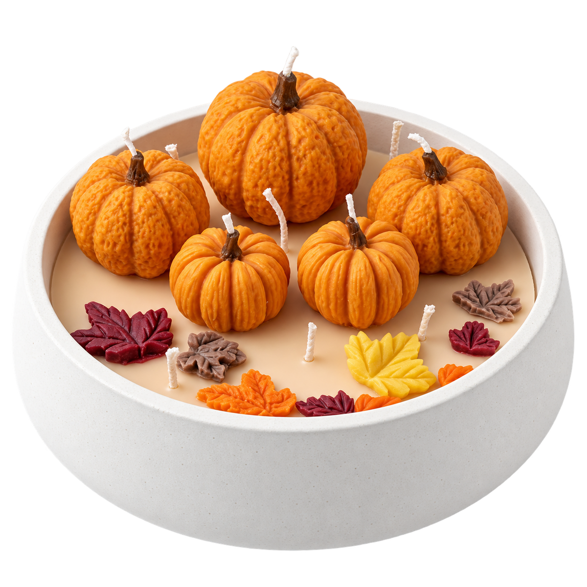 Vela artesanal tipo fuente con decoración otoñal de calabazas y hojas, fondo transparente.