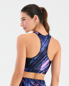 Top deportivo para mujer St. Even con espalda cruzada y estampado azul con rosa, ideal para yoga y entrenamiento.
