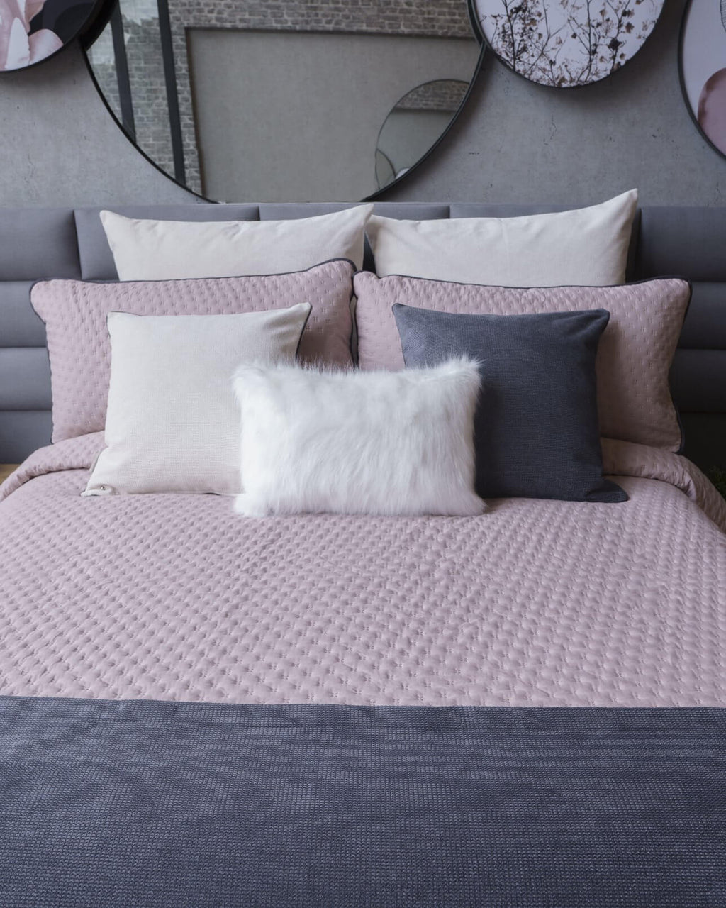 Elegant pink Toronto Rosa duvet cover set with modern quilting and decorative trim, adding a fresh, stylish touch to any bedroom.